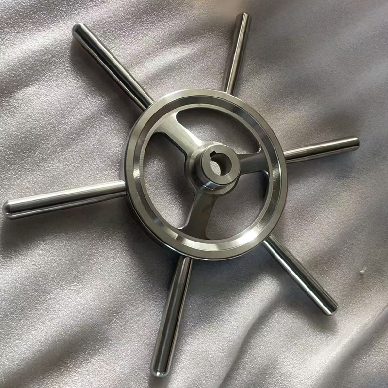 Stainless steel handwheels with polished finish and revolving handle for industrial machinery